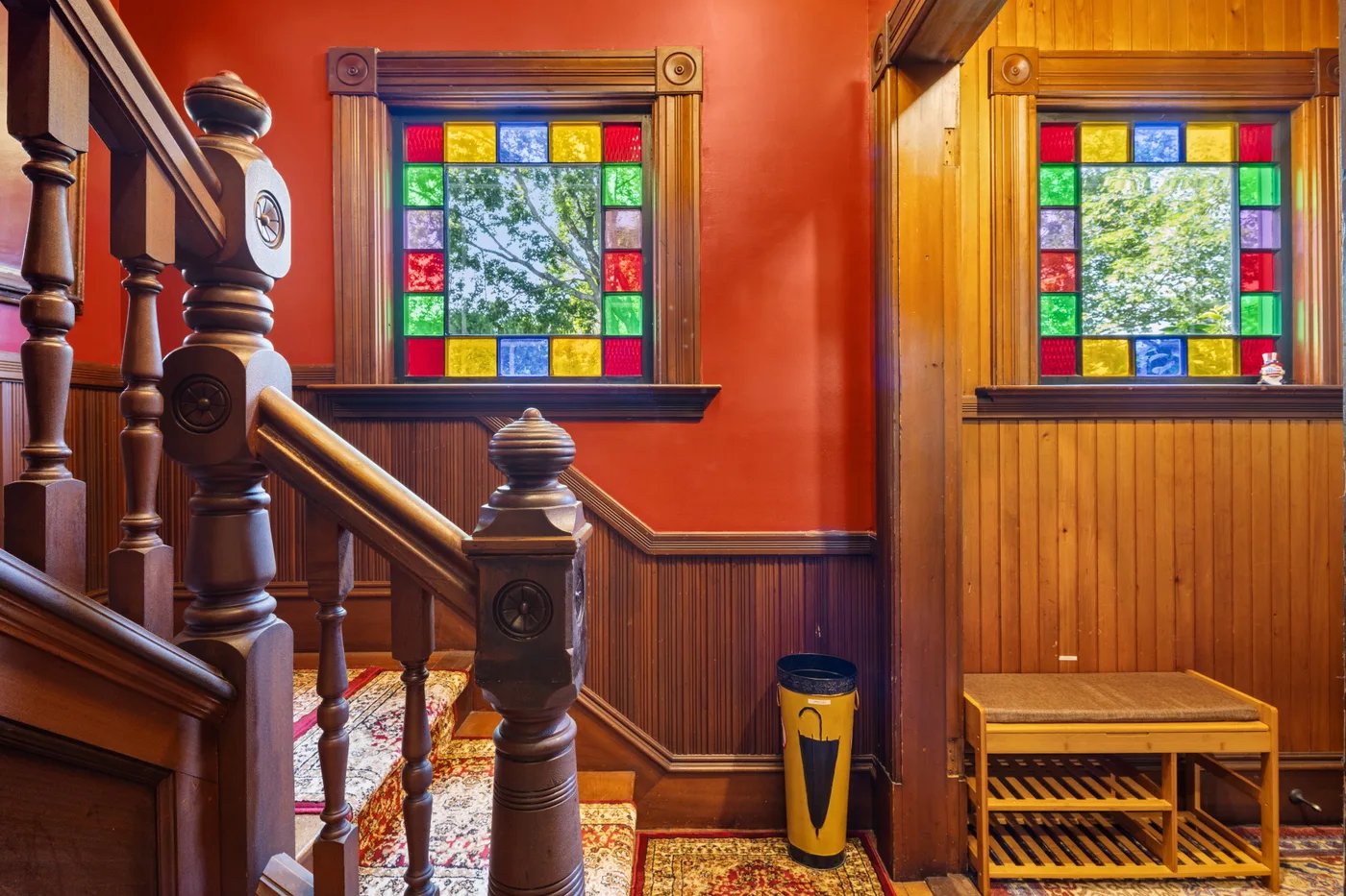 Historic detail — period stained-glass window in Main House