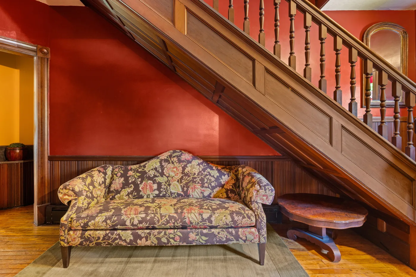 Historic architectural detail — original hardwood floors and Victorian-era built-ins