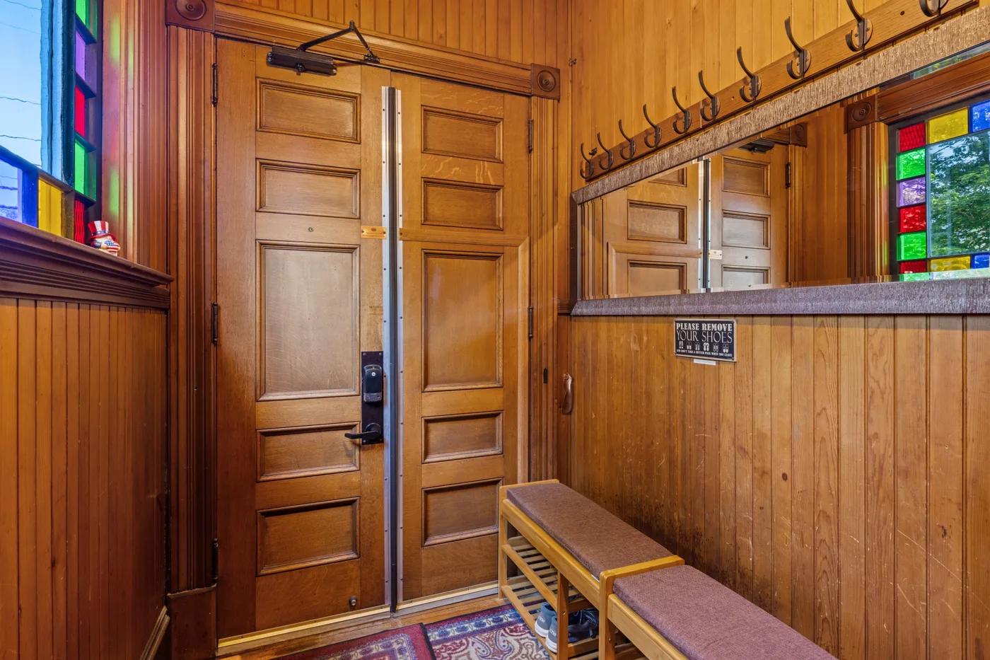 Main Inn entry foyer with original hardwood floors and period details
