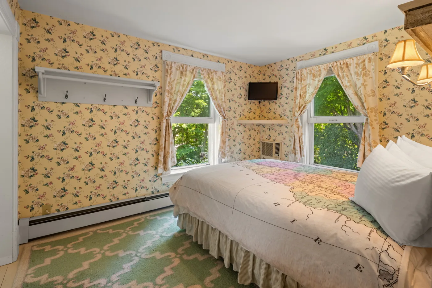 Small Queen Room — cozy queen bed and room overview