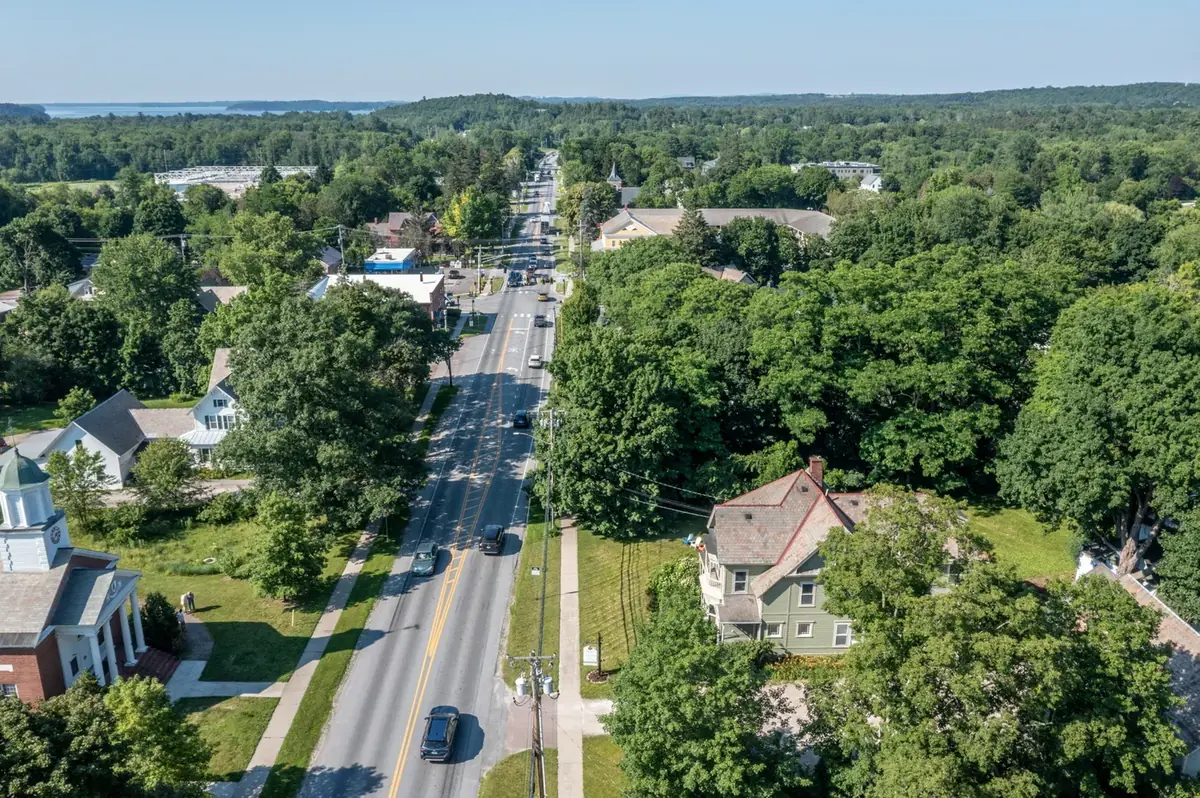 Aerial overview of Shelburne Village showing the inn's village-center location